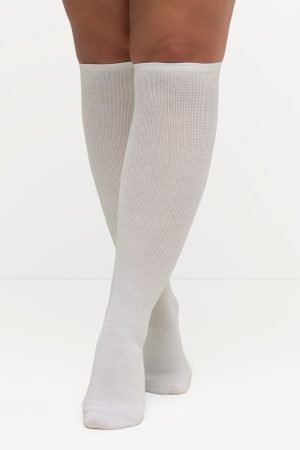 baltos kompresines kojines