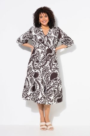 sokolado spalvos suknele 3/4 ilgio rankoves