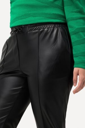 juodos dirbtines odos kelnes moterims